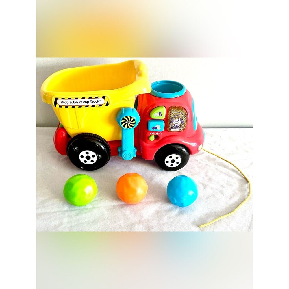 VTech Drop & Go Dump Truck Pull Along Learning Toy w/ 3 Rocks Lights Sounds